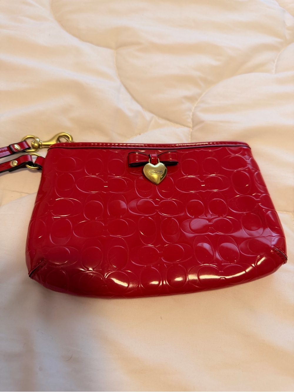 Coach Glossy Red Patent Wristlet with Heart Bow Accent